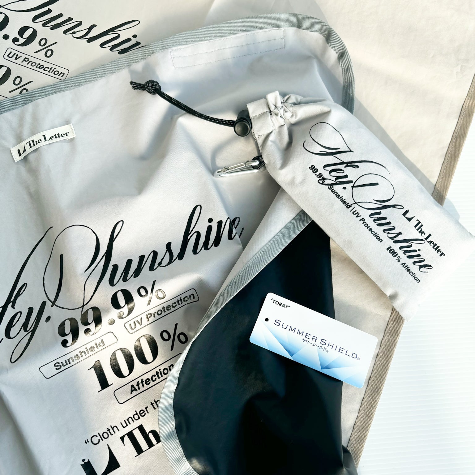 サンブロック OMAMORI クロス(ライトベージュ/ライトグレー)